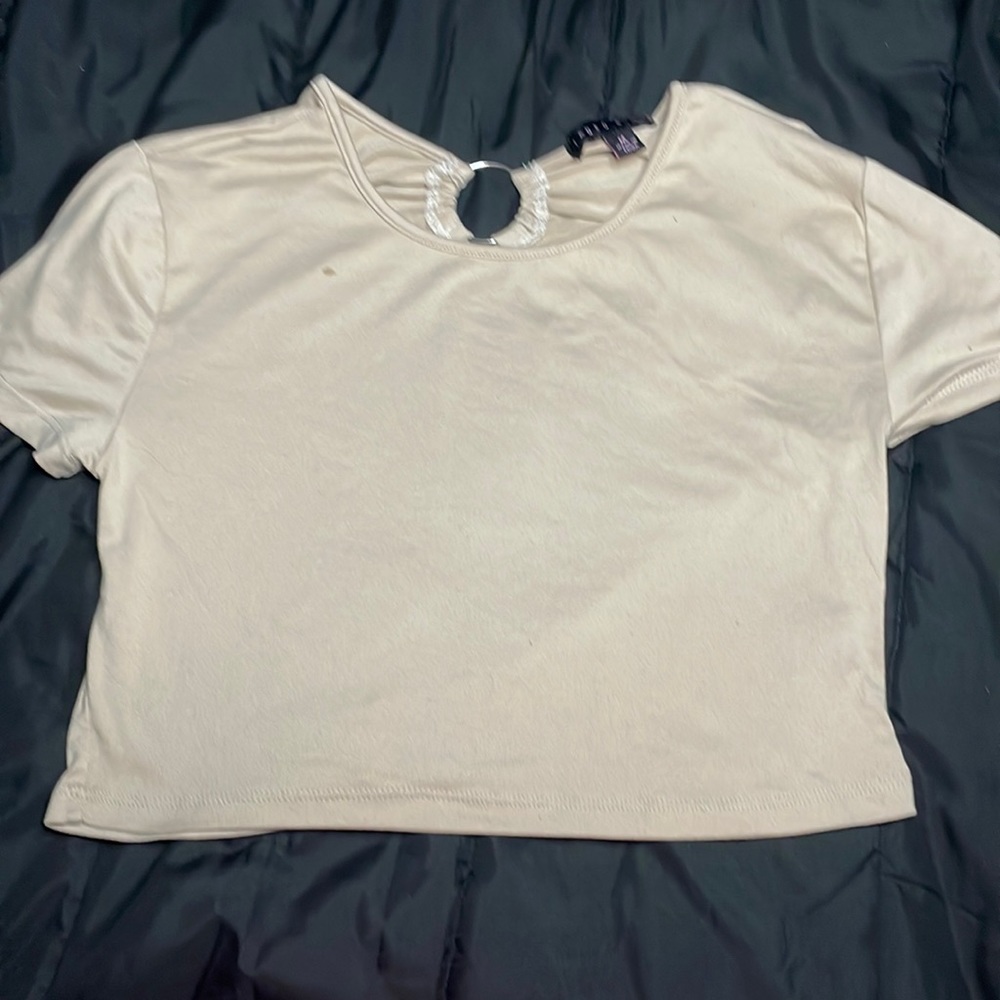 biege colored crop top